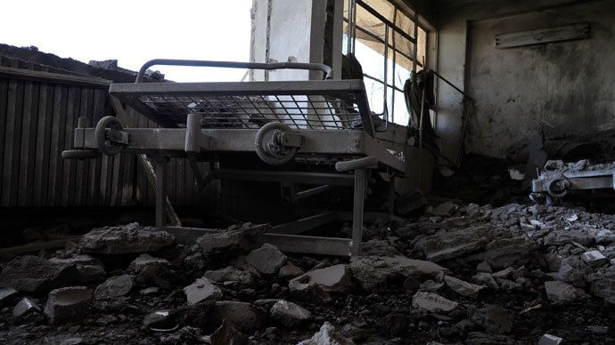 A view shows damaged medical beds at Raqqa national hospital, hit by what activists said was a Syrian Air Force fighter jet loyal to President Bashar al-Assad in Raqqa province, eastern Syria June 20, 2013.(Reuters / Nour Fourat)
