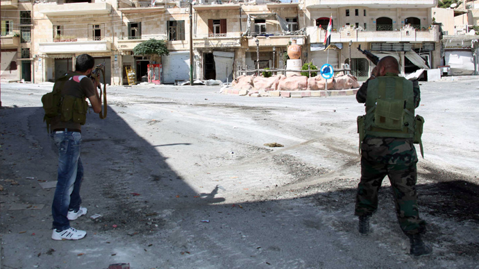‘Invisible, invincible in caves’: Syrian army battles rebels in ancient Christian town