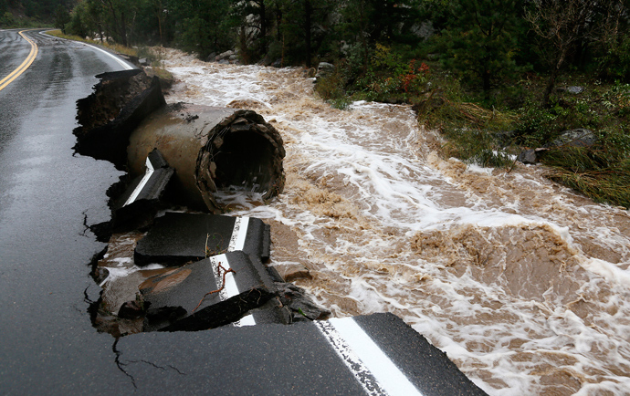 A section of Highway 72 is missing after a flash flood tore through Coal Creek near Golden, Colorado September 12, 2013 (Reuters / Rick Wilking)