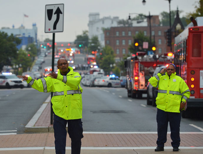 A general view shows police and first responder activity on M Street, SE near the Washington Navy Yard on September 16, 2013 in Washington, DC.(AFP Photo / Mandel Ngan)