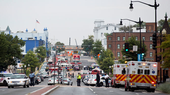 Police block off M Street, SE as they respond to a shooting at the Washington Navy Yard, in Washington September 16, 2013. (Reuters / Joshua Roberts)