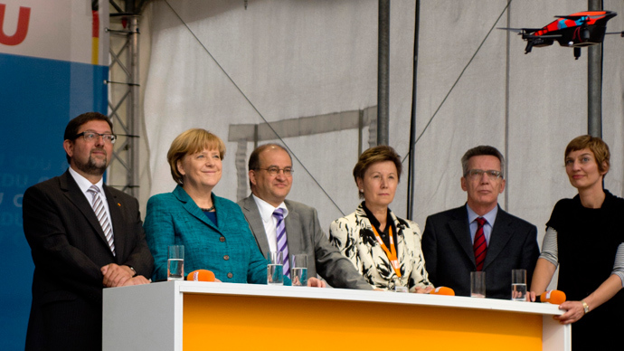 German ‘Pirates’ stage mini-drone stunt at Merkel rally