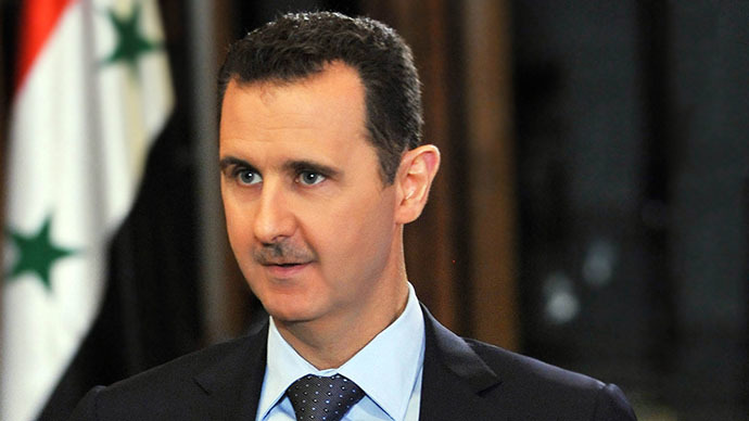 Assad vows to destroy chemical weapons within about a year