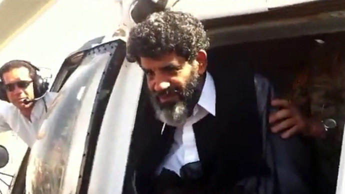 Handout video grab taken from footage shot by a member of Libyan security forces shows Abdullah al-Senussi, a former spy of late Libyan leader Muammar Gaddafi, arriving at the high security prison facility in Tripoli, on September 5, 2012. (AFP/HO)
