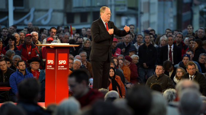Chancellor candidate of German Social Democratic (SPD) party Peer Steinbrueck delivers his speech at an election campaign event on September 20, 2013 in Kassel.(AFP Photo / Odd Andersen) 