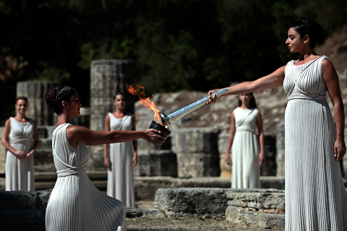 Sochi 2014 Flame lit in Olympia kicking off record-breaking torch relay ...