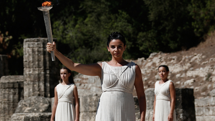 Sochi 2014 Flame lit in Olympia kicking off record-breaking torch relay ...