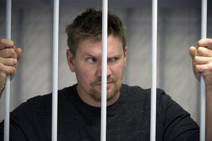 This handout picture released on September 29, 2013 by Greenpeace International shows Greenpeace activist Anthony Perret from the United Kingdom at the Leninsky district Court of Murmansk. (AFP Photo/Dmitri Sharomov)
