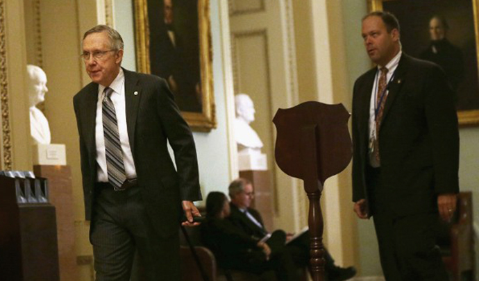 U.S. Majority Leader Sen. Harry Reid (D-NV) arrives at the U.S. Capitol for the day October 15, 2013 on Capitol Hill in Washington, DC. (AFP Photo / Alex Wong)