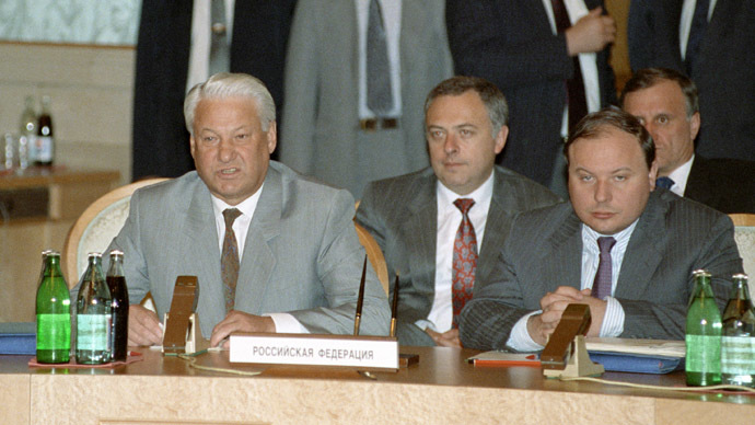 Russia's President Boris Yeltsin, seated left; Deputy Prime Minister Yegor Gaidar, seated 2nd right; Foreign Minister Andrei Kozyrev, seated 2nd left; and State Secretary Gennady Burbulis (RIA Novosti/Yuryi Abramochkin)