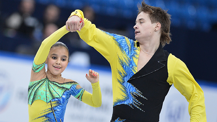 Lina Fyodorova and Maxim Miroshkin performing their pairs short program at the Junior Grand Prix of Figure Skating Final. Sochi, Russia. (RIA Novosti / Alexander Vilf)