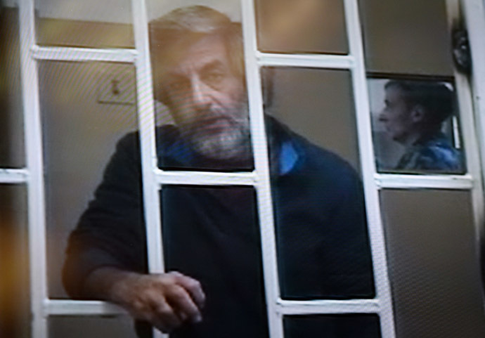 Greenpeace activist Andrey Allakhverdov, charged with an attempted trespassing on Prirazlomnaya rig, is seen here as Murmansk Region Court considered an appeal against his arrest (picture taken from the monitor in the courtroom). (RIA Novosti/ Konstantin Chalabov)