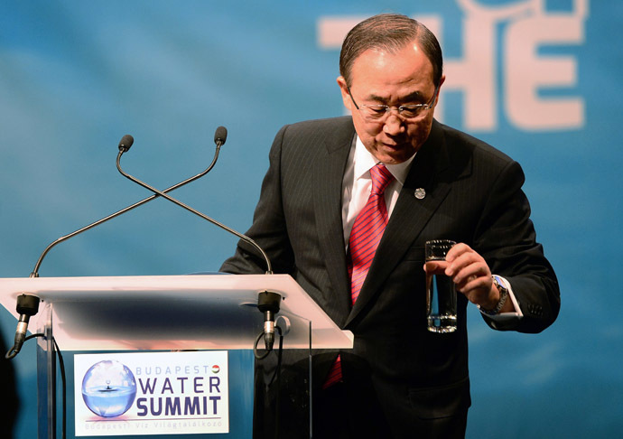 Secretary General of the United Nations Ban Ki-moon takes a glass of water as he makes his opening speech for 'Budapest Water Summit 2013' on the stage of the Millenaris Cultural Center in Budapest on October 8, 2013 during the beginning of the summit. Ban Ki-moon pays a visit to Hungary to open this world conference for clean water. (AFP Photo)