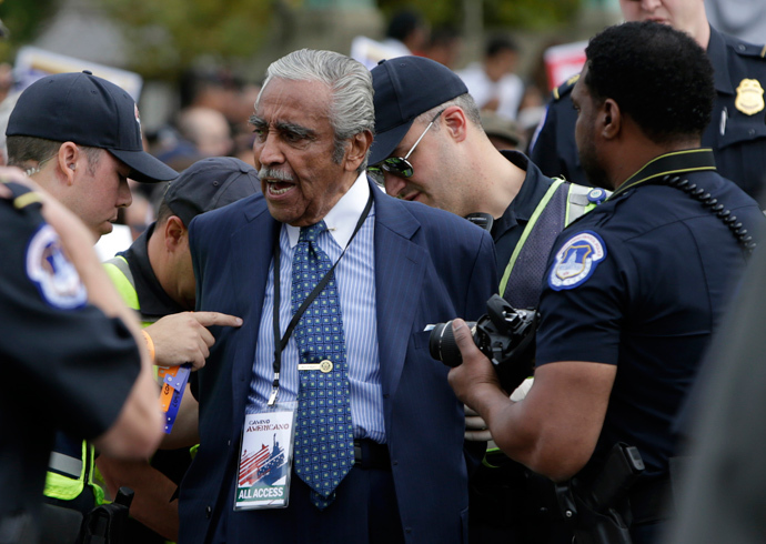 Representative Charles Rangel (D-NY) (C) is arrested by Capitol Hill police during a protest rally for immigrants rights on Capitol Hill in Washington October 8, 2013 (Reuters / Gary Cameron)