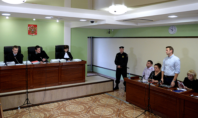 Russian protest leader Aleksey Navalny (2nd R) attends the hearing of his case in a court in the provincial northern city of Kirov, on October 16, 2013. (RIA Novosti / Maksim Bogodvid)