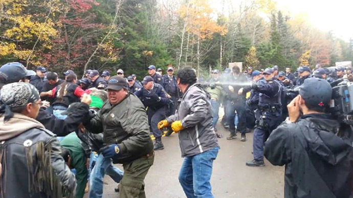Police hosing fracking protesters in New Brunswick, Canada. (Photo fronm twitter/@MattThor)