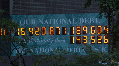 Safe from shutdown: Obama signs trillion-dollar budget