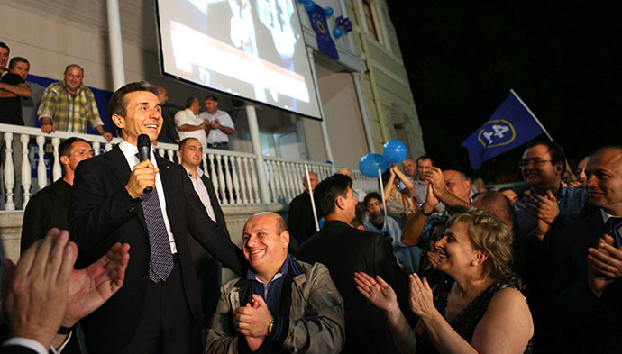 Bidzina Ivanishvili (L) addressing his supporters on October 1, 2012. (AFP Photo / Giorgy Kakulia)