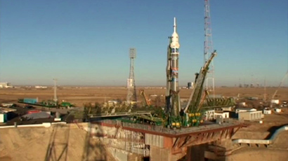 Olympic touchdown! ISS crew and Sochi torch back on Earth