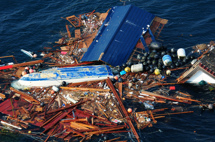 In this image released by the US Navy Visual News Service March 14, 2011 shows an aerial view of debris on March 13, 2011 from an 8.9 magnitude earthquake and subsequent tsunami that struck northern Japan. (AFP Photo/Navy Visual News Service/Mass Communication Specialist 3rd Class Alexander Tidd) 