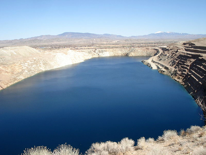 Anaconda Copper Mine. Inactive since 1978, the pit has flooded. (Photo by Kelapstick / wikipedia.org)