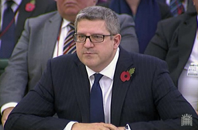 A screen grab from the UK's Parliamentary Recording Unit (PRU) shows Britain's director general of the domestic intelligence agency MI5, Andrew Parker, speaking during a questioning hearing by parliament's Intelligence and Security Committee in London on November 7, 2013. (AFP Photo/PRU)