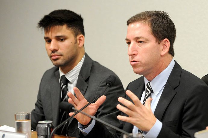 The Guardian's Brazil-based reporter Glenn Greenwald (R),and his partner David Miranda.(AFP Photo / Evaristo Sa )