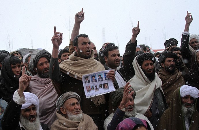 Afghan villagers shout slogans during a protest against U.S. special forces accused of overseeing torture and killings in Wardak province February 26, 2013. (Reuters)