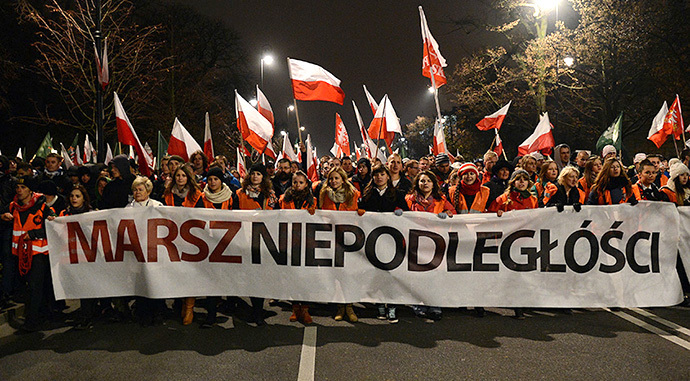 Far-right protesters take part in their annual march, which coincides with Poland's national Independence Day in Warsaw on November 11, 2013. (AFP Photo / Janek Skarzynski)