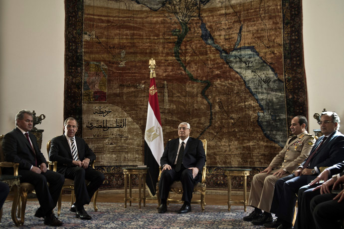 Egyptâs interim president Adly Mansour (C) defense minister Abdlefatah al-Sissi (2ndR) meet with Russian Foreign Minister Sergey Lavrov (2-L), and Russian Defense Minister Sergei Shoigu (L) on November 14, 2013 at the presidential palace in Cairo. (AFP Photo/Khaled Desouki)