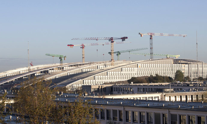 A view of the current NATO headquarters (Bottom) and the new headquarters under construction (Back) in Brussels on November 13, 2013. (AFP Photo/Virginia Mayo)