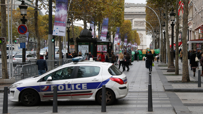 Gunman 'on the run and represents a real danger’ in Paris after newspaper, bank shootings