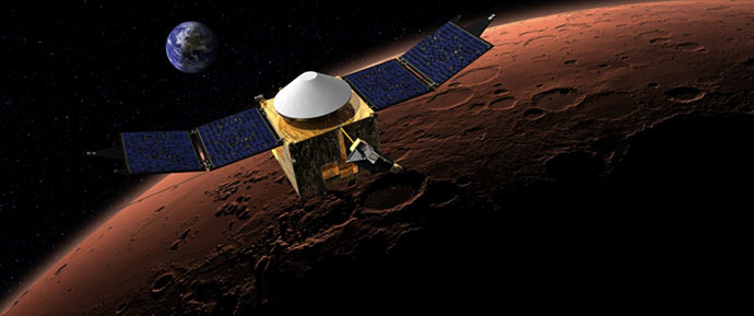 This artist's concept shows the MAVEN spacecraft in orbit around the Red Planet, with a fanciful image of her home planet in the background. (Credit: NASA/Goddard)