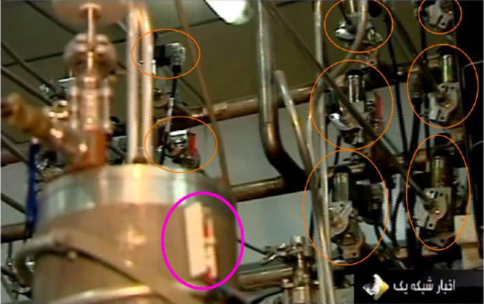 Connector pipes are equipped with isolation valves. The purpose of the valves is to isolate centrifuges from a cascade that start to vibrate, as signaled by vibration sensors (highlighted in magenta). Picture from âTo Kill a Centrifugeâ, a report on Stuxnet malware by Ralph Langner. 