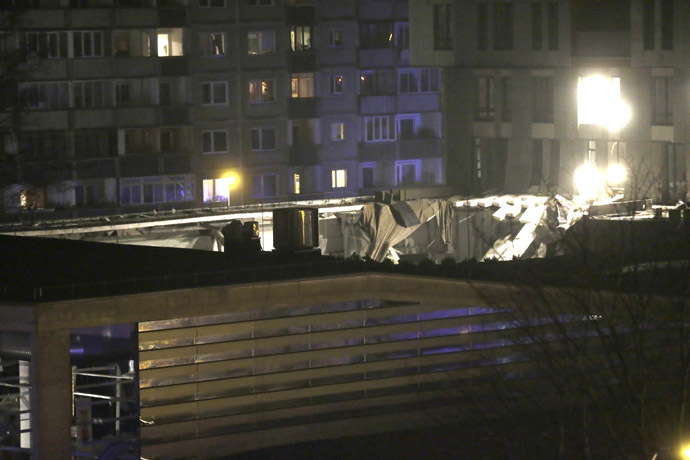 The collapsed roof of a store is pictured in Riga November 21, 2013. (Reuters/Ints Kalnins)