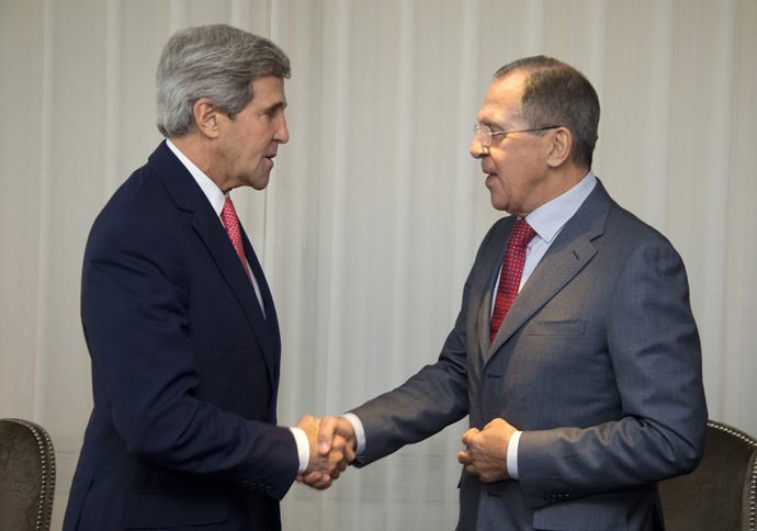 U.S. Secretary of State John Kerry (L) and Russia's Foreign Minister Sergei Lavrov shake hands during a photo opportunity prior to their meeting, in Geneva November 23, 2013. (Reuters/Carolyn Kaster)