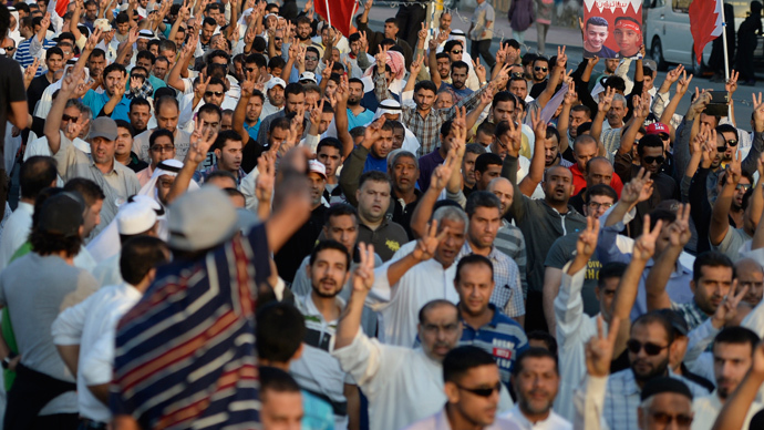 Bahrain court jails 12 protesters, acquits policeman