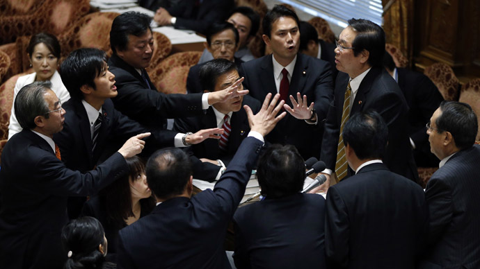 Japan's ruling coalition pushes heavy-handed state secrets bill through lower house