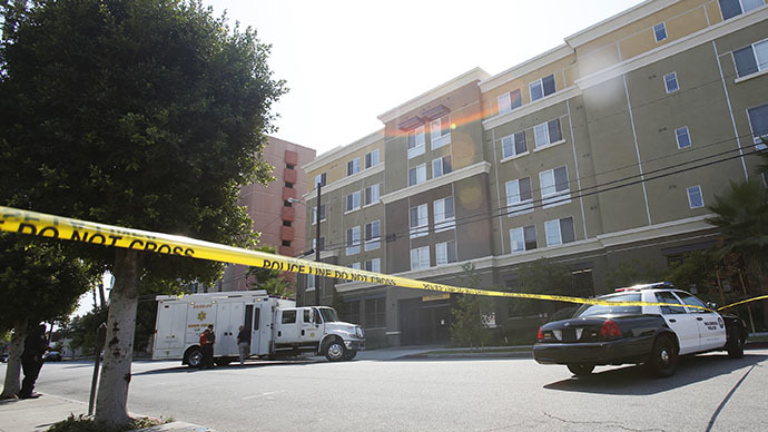 Police officer shot in LA area, gunmen surrenders after hostage standoff