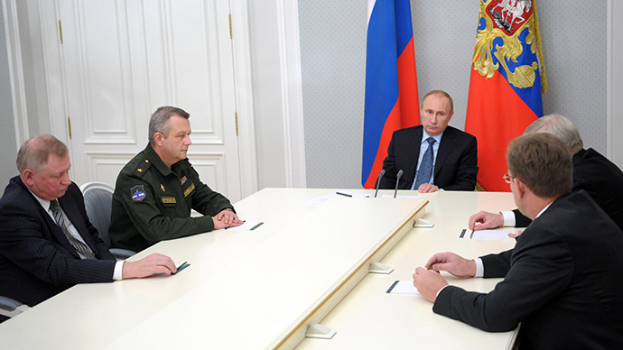 Russian President Vladimir Putin, center, chairs a meeting in Bocharov Ruchey residence on aerospace defense issues on 28 November 2013. (RIA Novosti / Aleksey Nikolskyi)