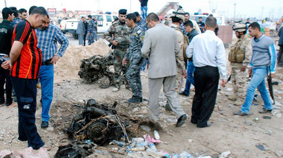 Iraqi policeman throws himself on suicide bomber, dies saving pilgrims