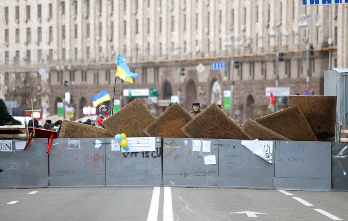 Protesters are seen near barricades which blocked the main avenue in Kiev December 2, 2013. (Reuters / Vasily Fedosenko)