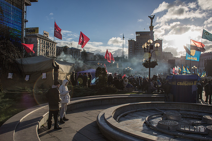 Activists stay in front of tents set up during a protest on Kievâs central square on December 2, 2013. (RIA Novosti / Andrey Stenin)