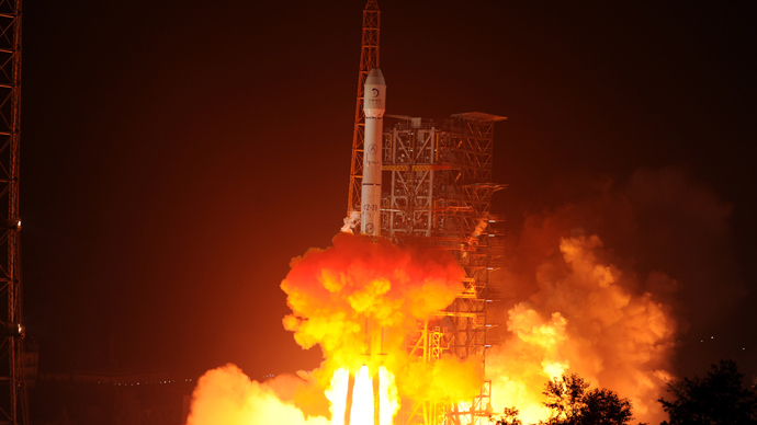 China launches lunar probe with first moon rover aboard