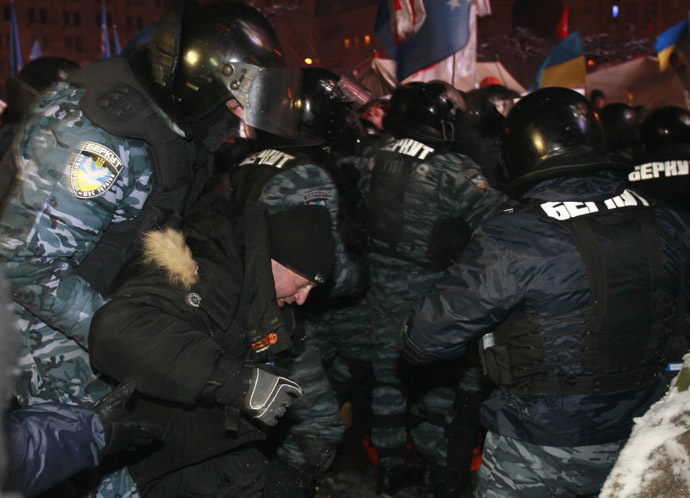 Riot police officers detain a protester in Kiev December 11, 2013. (Reuters/Gleb Garanich) 