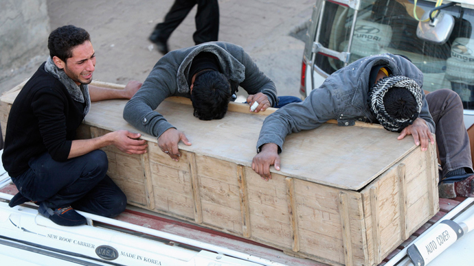 Iraqi policeman throws himself on suicide bomber, dies saving pilgrims