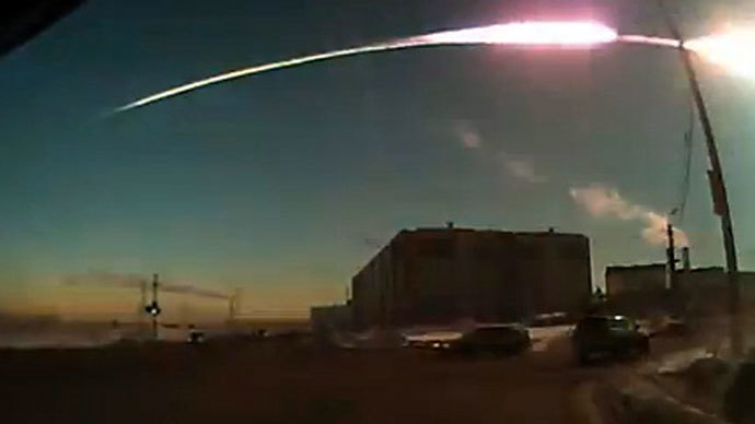 The trace of a flying object in the sky over Chelyabinsk (still from a dashboard camera). Photo courtesy of Nakanune.RU.(RIA Novosti)