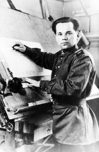 Senior Sergeant Mikhail Kalashnikov as he designed his AK-47 assault rifle. (RIA Novosti) 