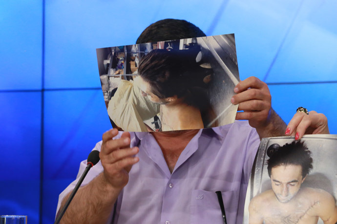 Abdulbaki Todashev, the father of Ibraghim Todashev, attending the press conference at the RIA Novosti Agency. (RIA Novosti/Alexander Natruskin)