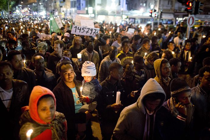 Several thousand African asylum seekers who entered Israel illegally via Egypt staged a peaceful protest in Tel Aviv on December 28 2013 (AFP Photo / Oren Ziv)